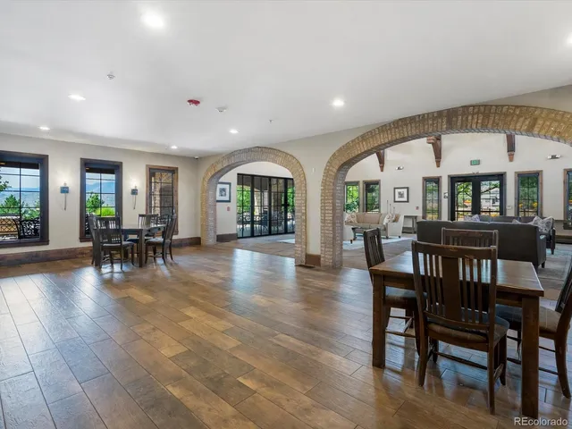 a terrace of a house with outdoor seating