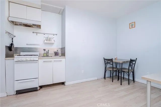 a view of kitchen and cabinets