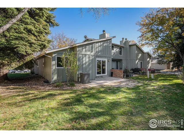 an aerial view of a houses with ocean view