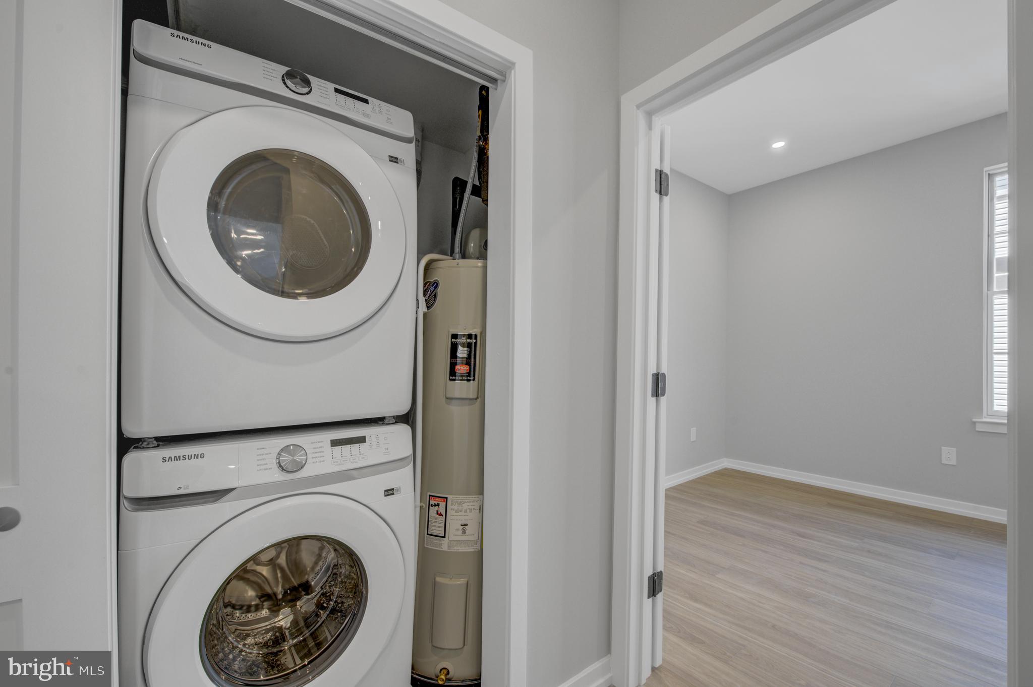 2445 Innovator Way, Unit 3D Philadelphia, PA 19146 - Photo 14 of 19 a view of a hallway with washer and dryer