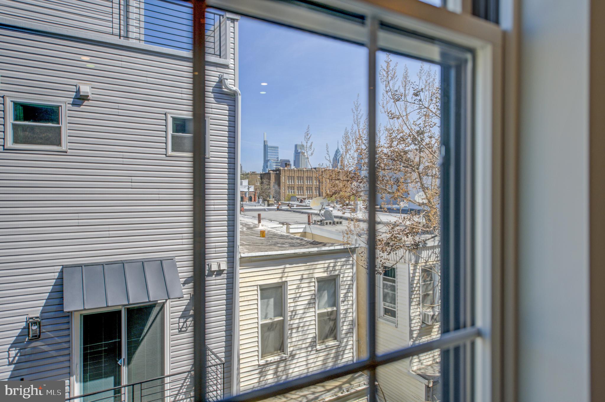 2445 Innovator Way, Unit 3D Philadelphia, PA 19146 - Photo 16 of 19 a view of a balcony and a floor to ceiling window