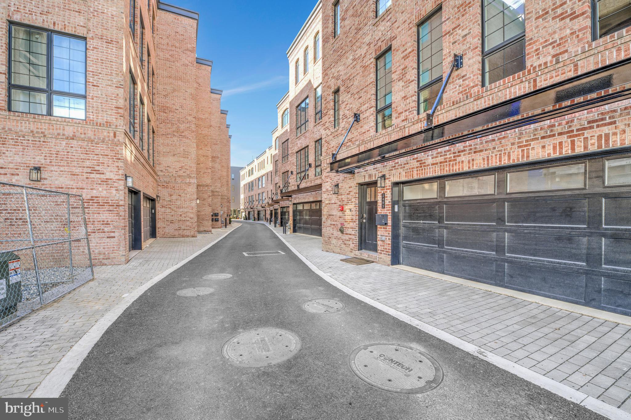 2445 Innovator Way, Unit 3D Philadelphia, PA 19146 - Photo 18 of 19 a view of a backyard with wooden fence