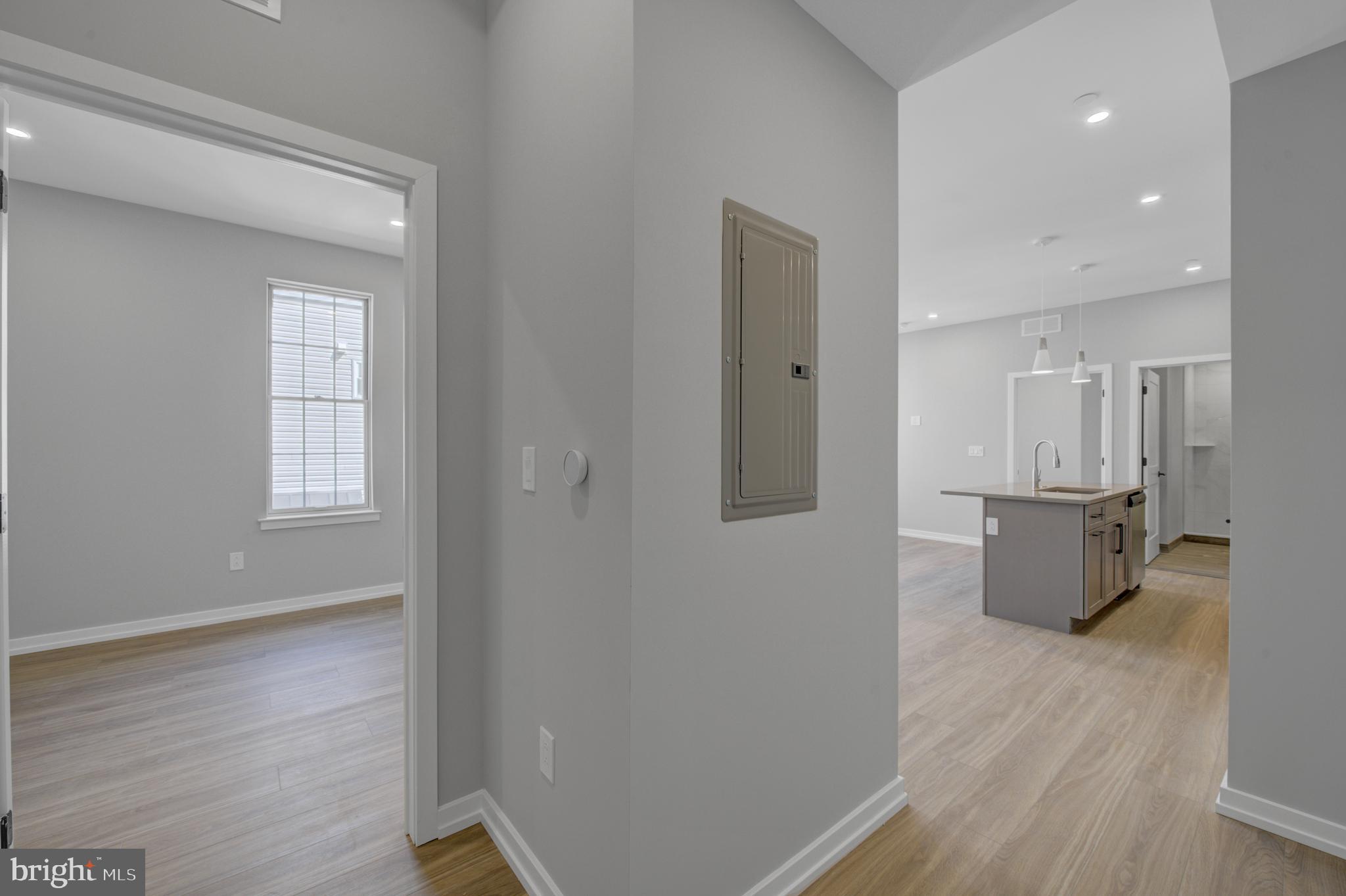 2445 Innovator Way, Unit 3D Philadelphia, PA 19146 - Photo 8 of 19 a view of kitchen with furniture and wooden floor