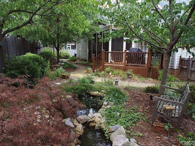 6509 Arbor Grande Way Raleigh, NC 27615 - Photo 12 of 12 Professionally landscaped backyard offers much to enjoy without a lot of maintenance. Also, don't miss the deck where you can grill out! Yard