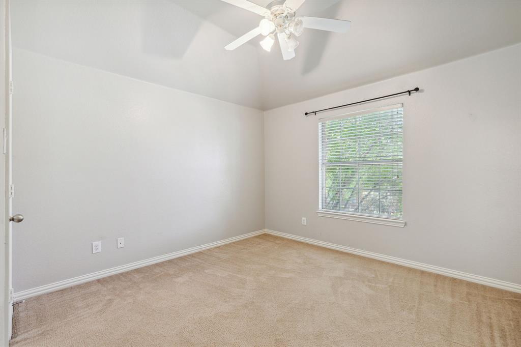 3370 Nation Drive Frisco, TX 75034 - Photo 23 of 37 an empty room with a window and a fan