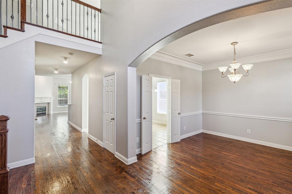 3370 Nation Drive Frisco, TX 75034 - Photo 4 of 37 a view of a livingroom with wooden floor