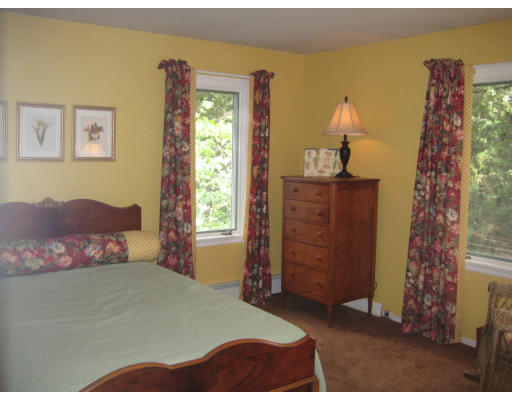 2 Abbott Road Maynard, MA 01754 - Photo 18 of 26 a bedroom with a bed and a dresser