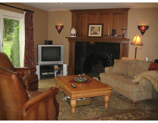 2 Abbott Road Maynard, MA 01754 - Photo 8 of 26 a living room with furniture and a fireplace