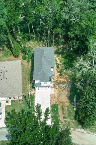 a view of a city and green space