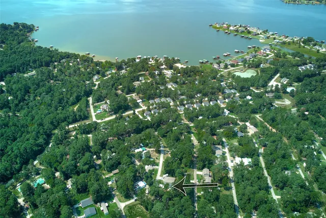 a view of a lake with a yard