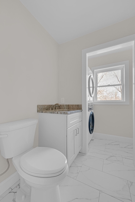 7 L Stevens Road, Unit B Charlton, MA 01507 - Photo 19 of 23 a bathroom with a toilet a sink and mirror