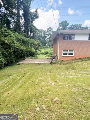 a view of a house with a swimming pool