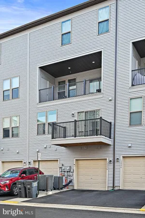 a car parked in front of a house
