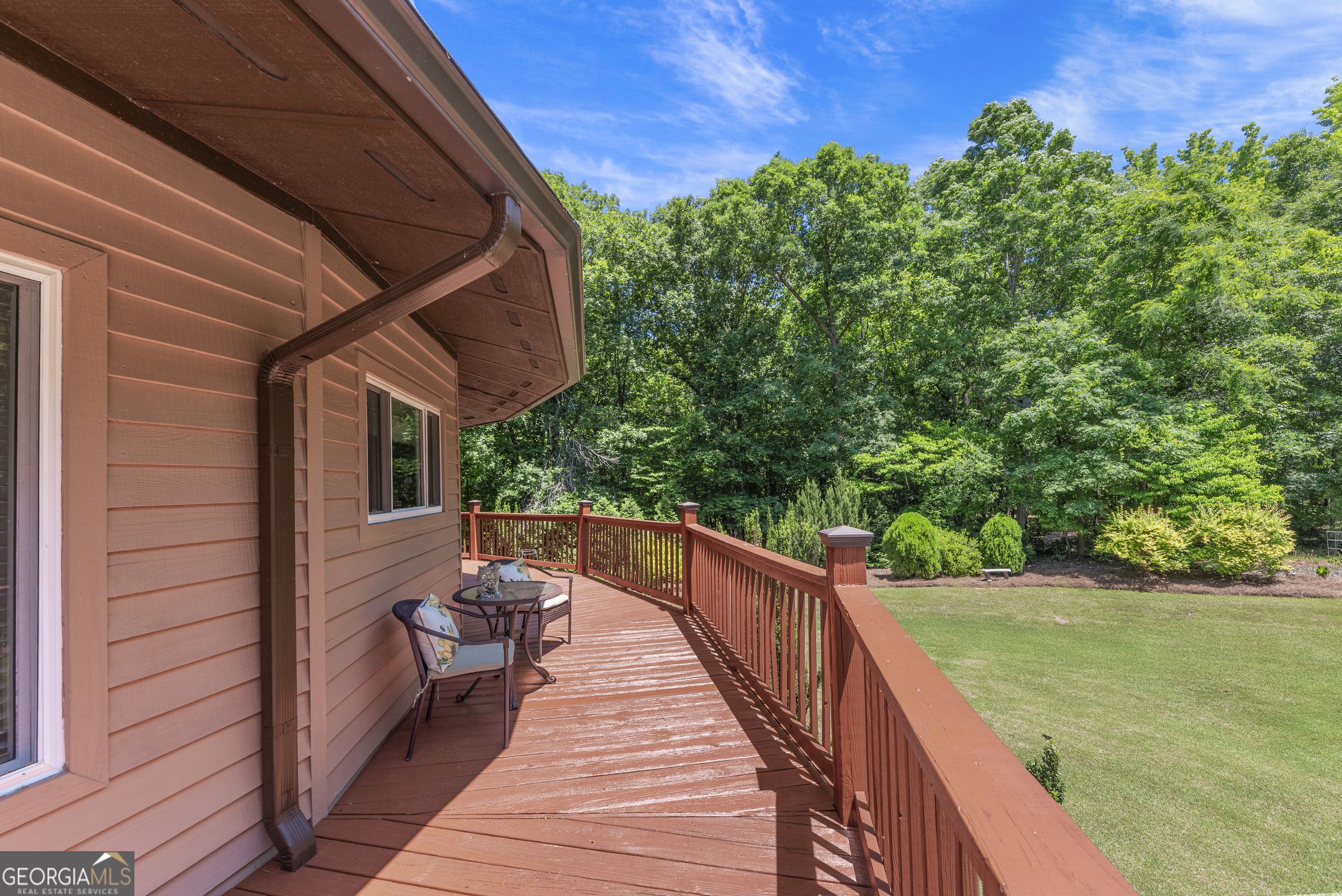 1170 Cedar Grove Road Buckhead, GA 30625 - Photo 34 of 51 a balcony with wooden floor and outdoor seating