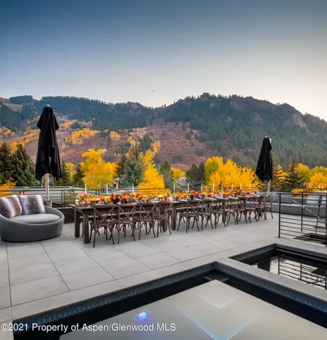 a view of a chairs and table in the terrace