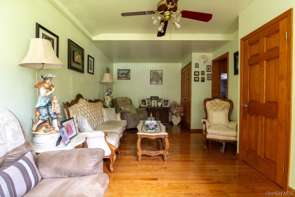 139 Haddock Road Monticello, NY 12701 - Photo 16 of 40 Living room featuring light wood-style floors and ceiling fan
