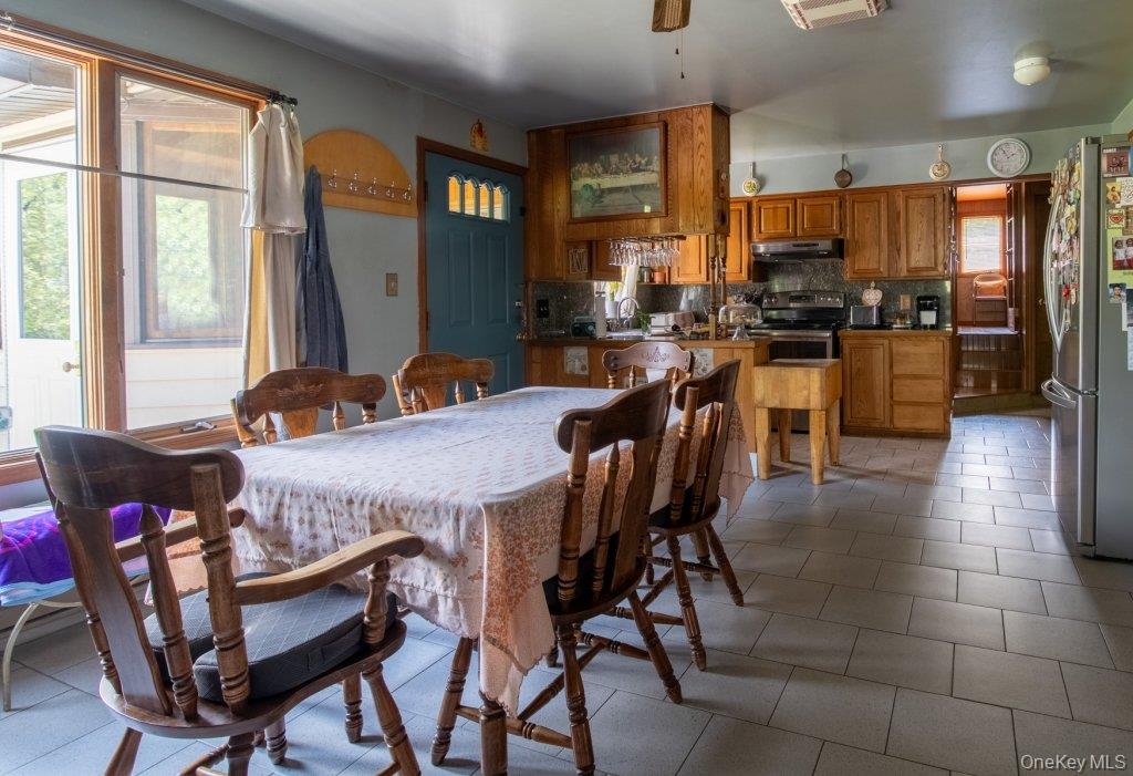 139 Haddock Road Monticello, NY 12701 - Photo 19 of 40 Dining space featuring tile patterned flooring