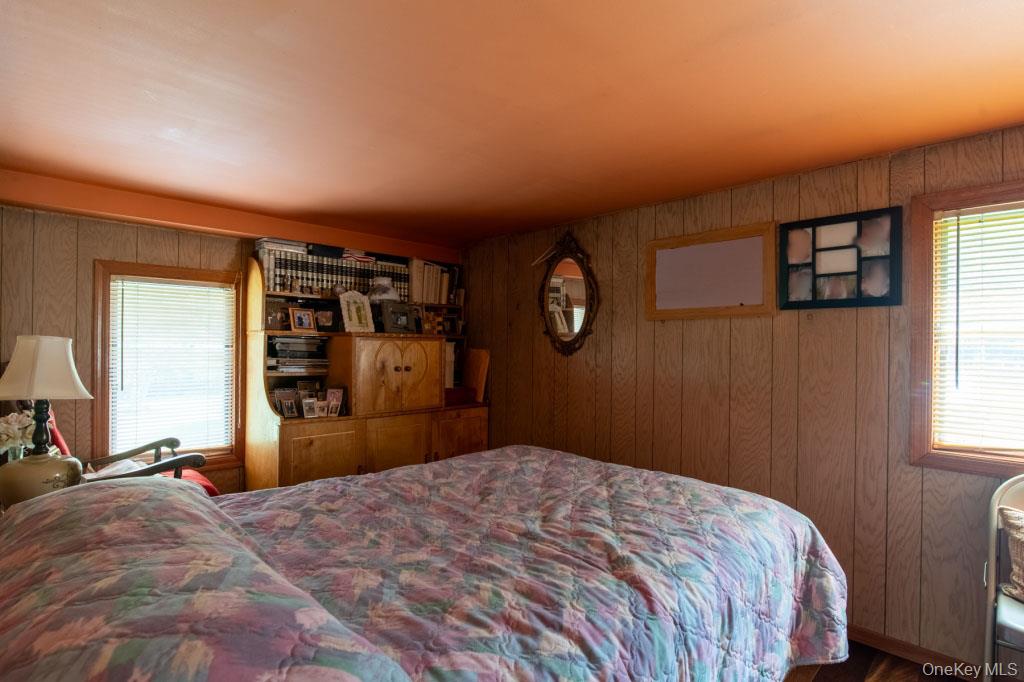 139 Haddock Road Monticello, NY 12701 - Photo 25 of 40 Bedroom with wood walls