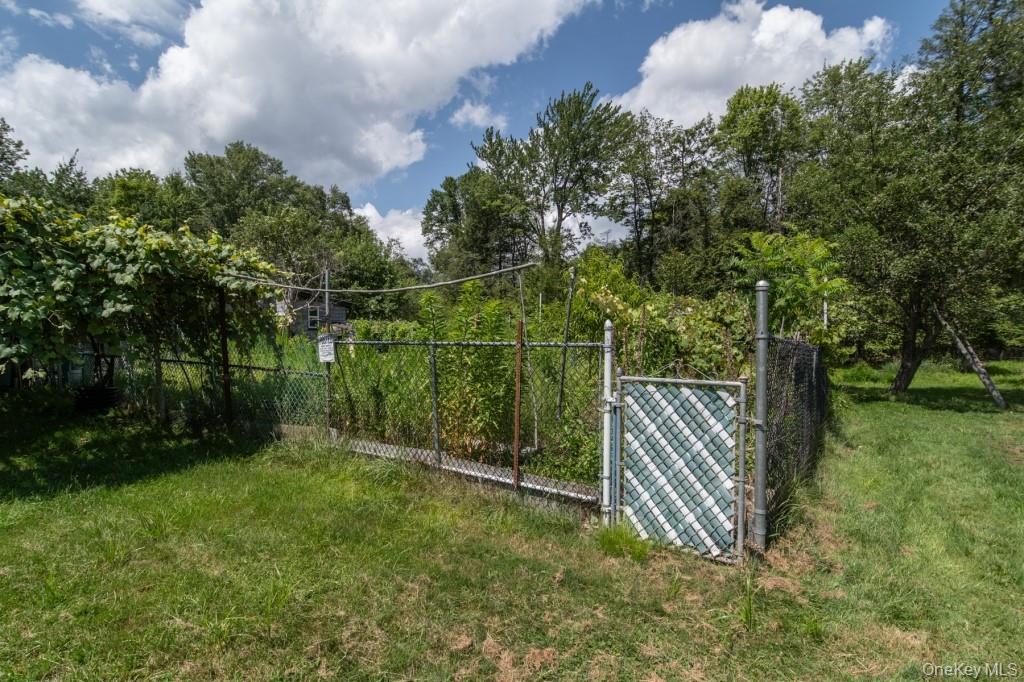 139 Haddock Road Monticello, NY 12701 - Photo 33 of 40 View of yard featuring a gate