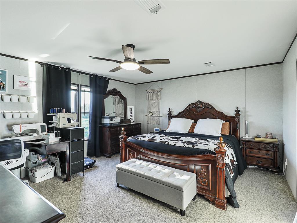 2149 Webb Smith Road Sherman, TX 75090 - Photo 12 of 39 a bedroom with furniture and a window