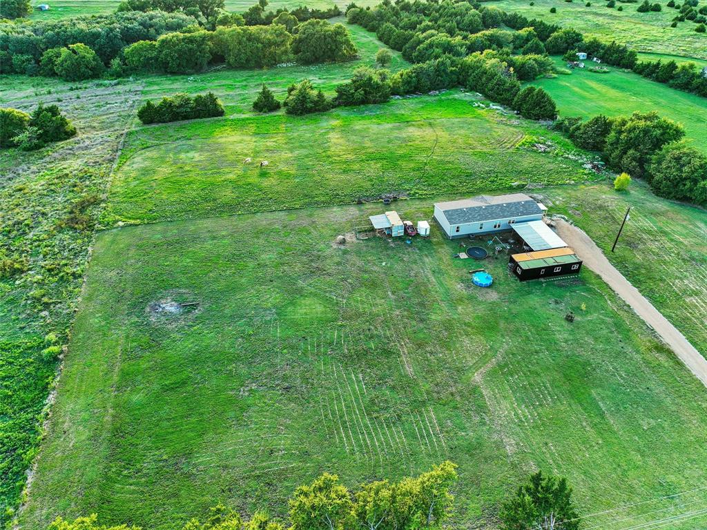 2149 Webb Smith Road Sherman, TX 75090 - Photo 27 of 39 a backyard of a house with lots of green space