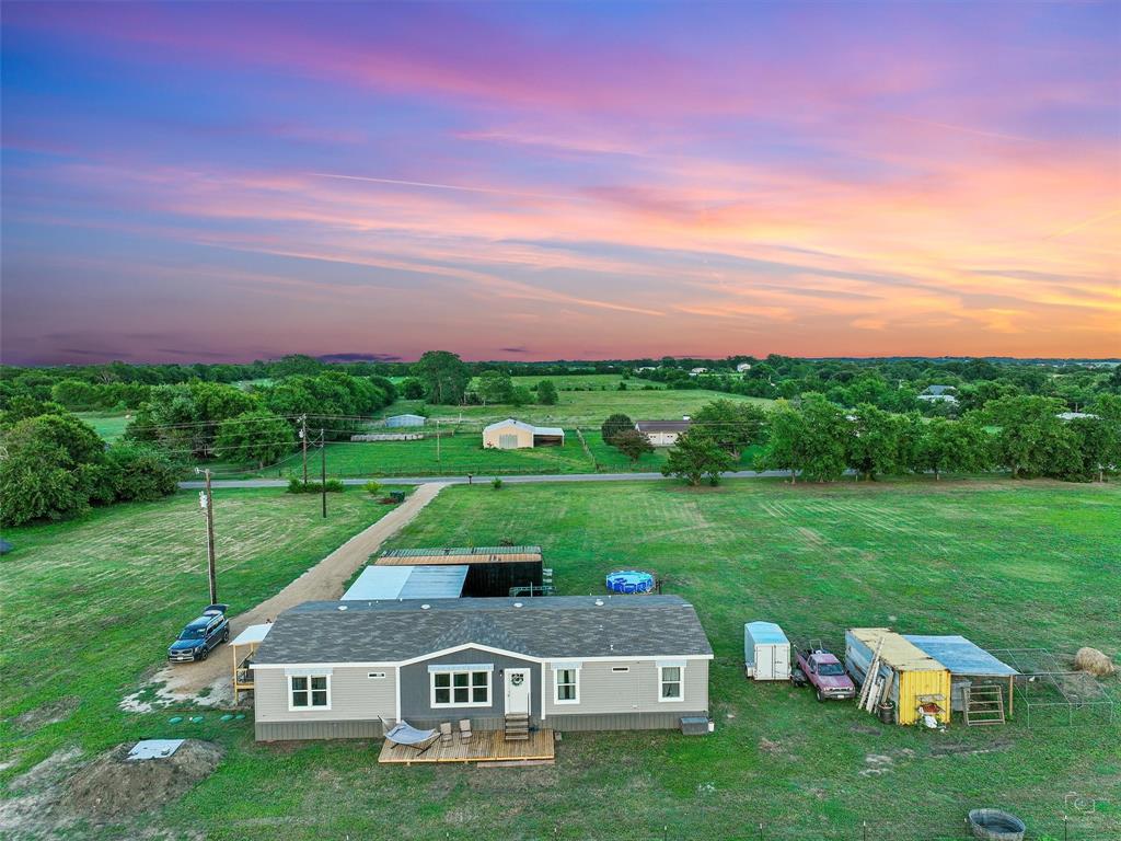 2149 Webb Smith Road Sherman, TX 75090 - Photo 37 of 39 a front view of a house with garden
