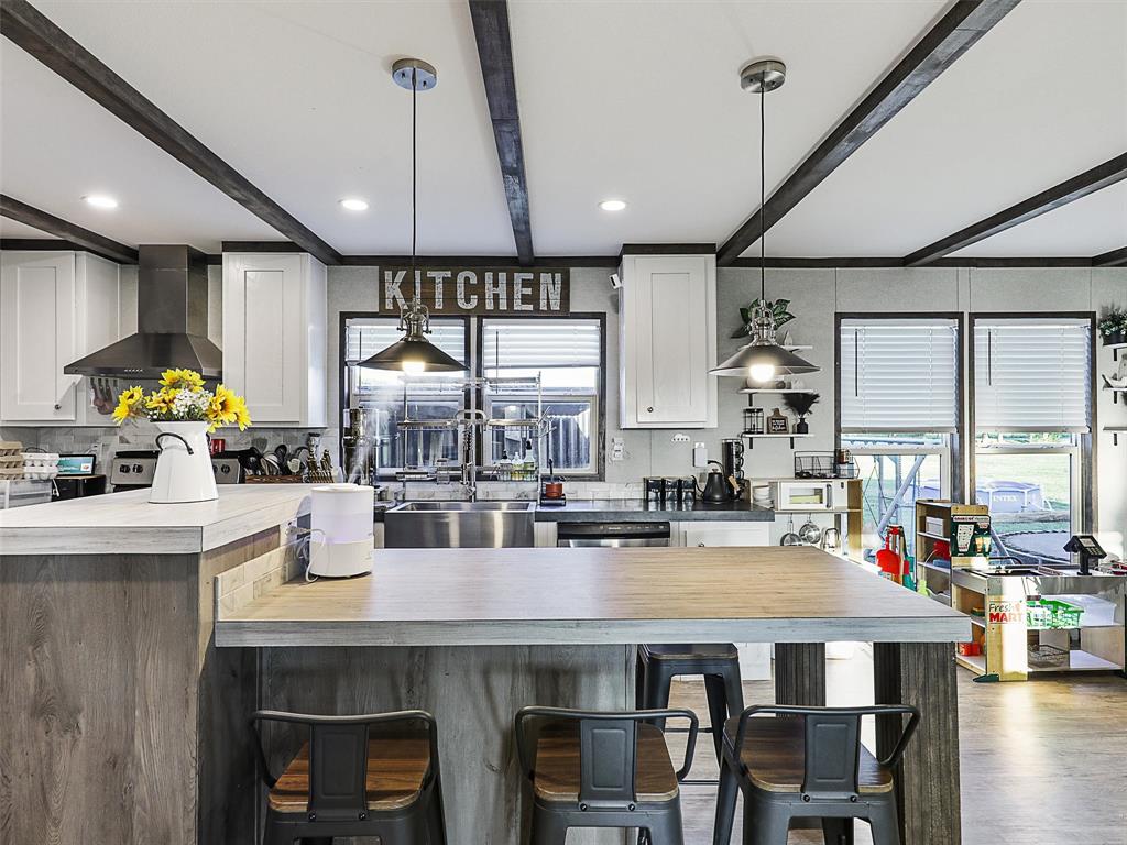 2149 Webb Smith Road Sherman, TX 75090 - Photo 5 of 39 a kitchen with a table and chairs in it