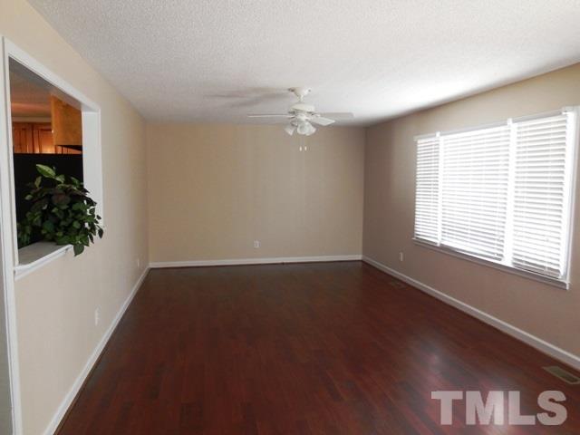 324 Microwave Tower Road Roseboro, NC 28382 - Photo 3 of 24 an empty room with a window