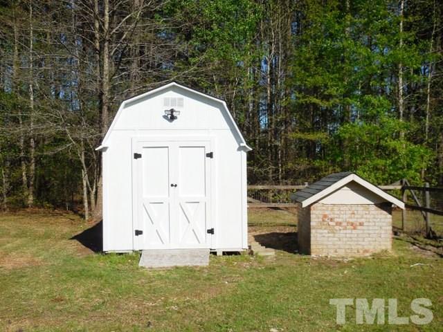 324 Microwave Tower Road Roseboro, NC 28382 - Photo 22 of 24 a view of backyard of house