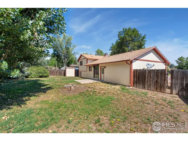 a house view with a backyard space