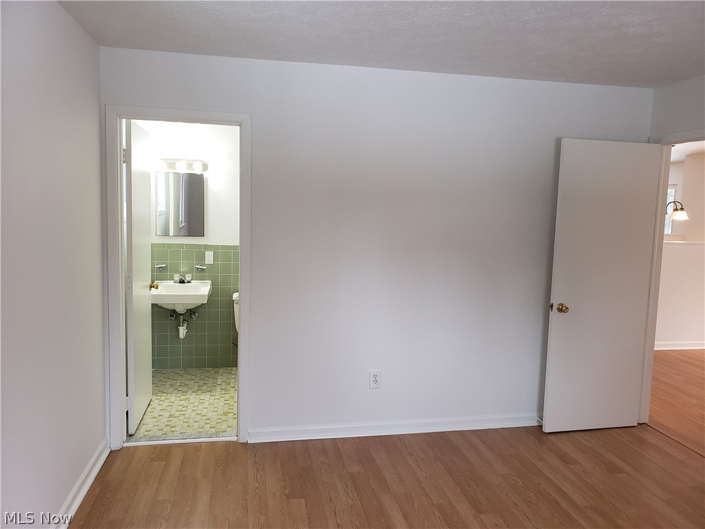 11415 Ferry Road Chesterland, OH 44026 - Photo 16 of 31 master bedroom with 1/2 bath