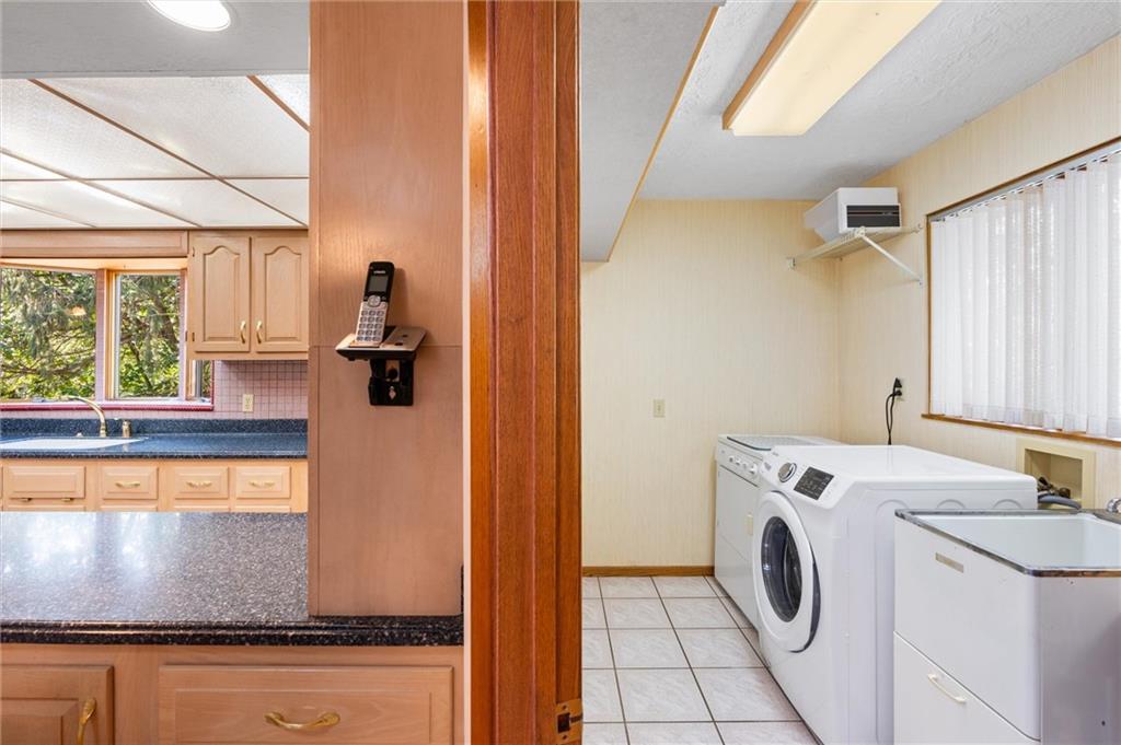 1164 River Road Freeport, PA 16229 - Photo 15 of 50 a view of bathroom with washer and dryer