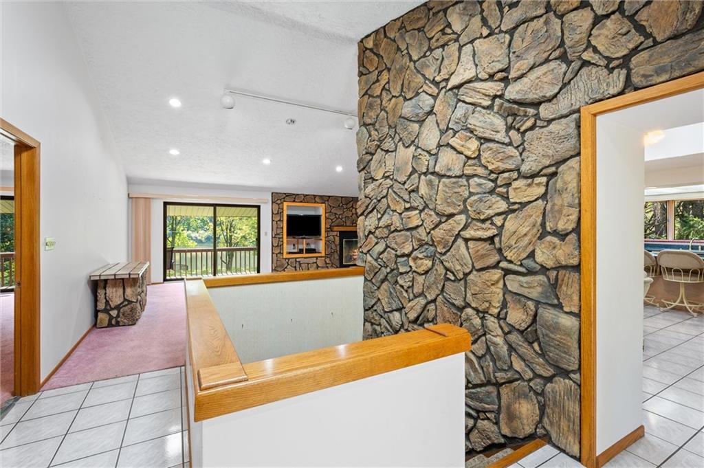 1164 River Road Freeport, PA 16229 - Photo 16 of 50 a living room with a couch and a bookshelf