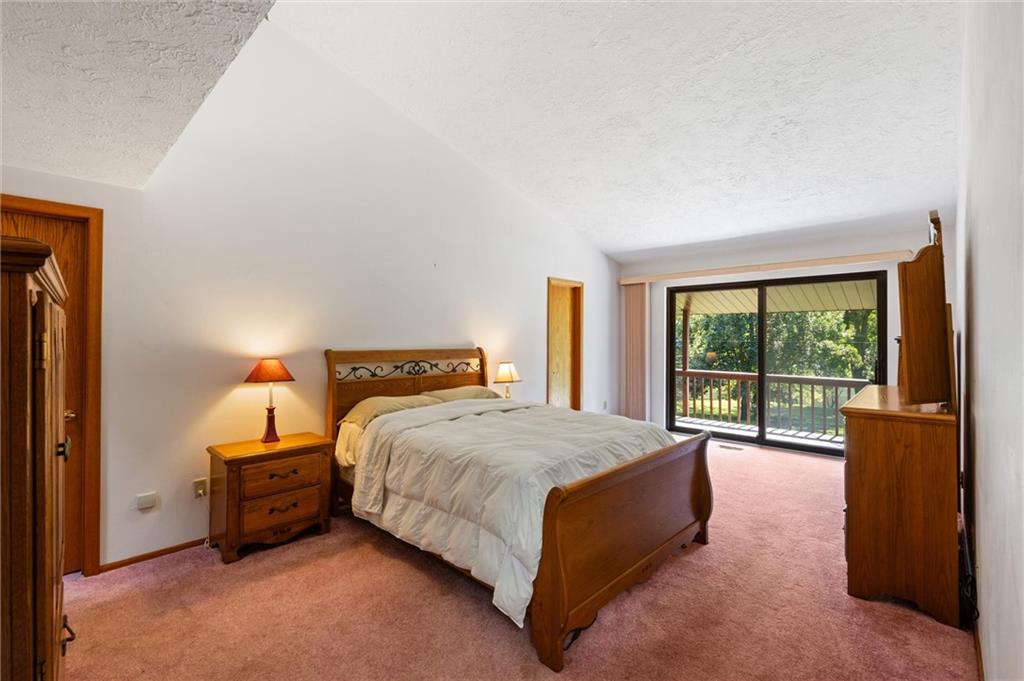 1164 River Road Freeport, PA 16229 - Photo 19 of 50 a bedroom with a bed and a large window