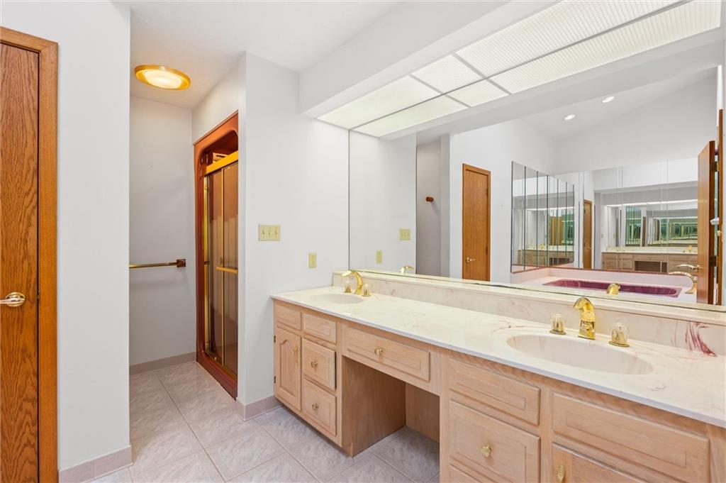 1164 River Road Freeport, PA 16229 - Photo 21 of 50 a spacious bathroom with a sink and a mirror