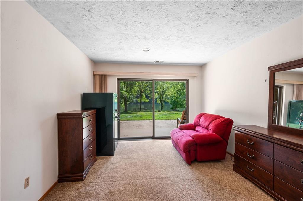 1164 River Road Freeport, PA 16229 - Photo 28 of 50 a bed room with a bed and a television