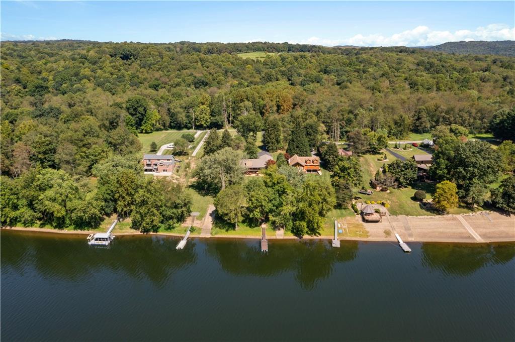 1164 River Road Freeport, PA 16229 - Photo 3 of 50 a view of a lake with mountains in the background