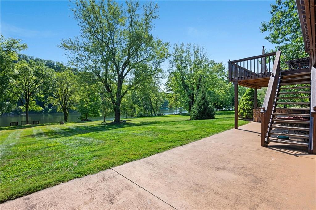 1164 River Road Freeport, PA 16229 - Photo 31 of 50 a view of a deck with a yard and furniture