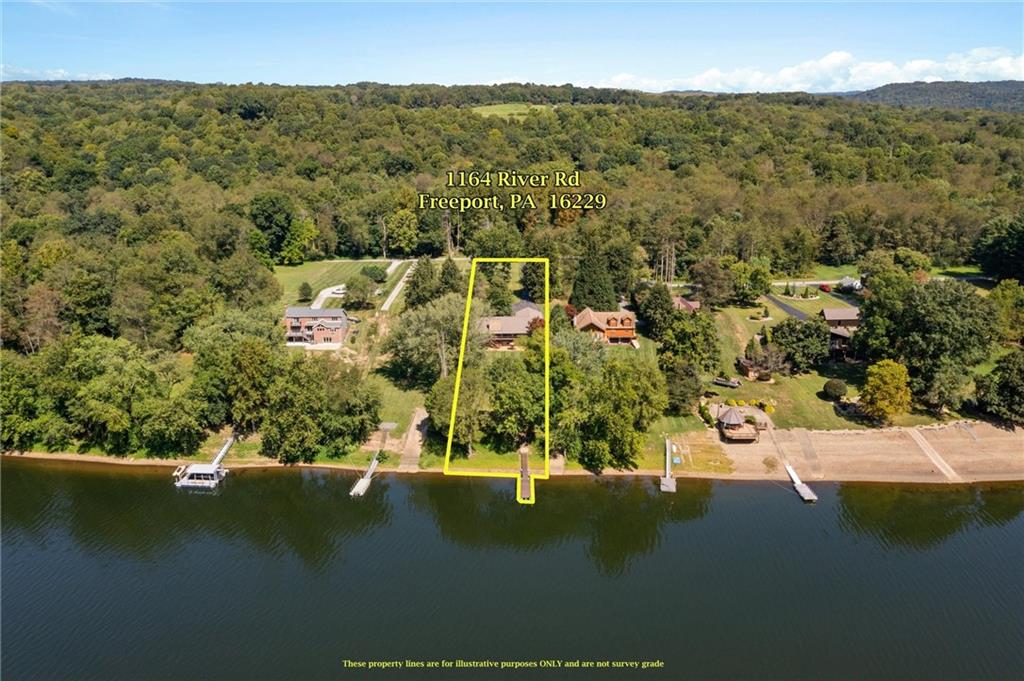 1164 River Road Freeport, PA 16229 - Photo 35 of 50 an aerial view of residential houses with outdoor space and lake view