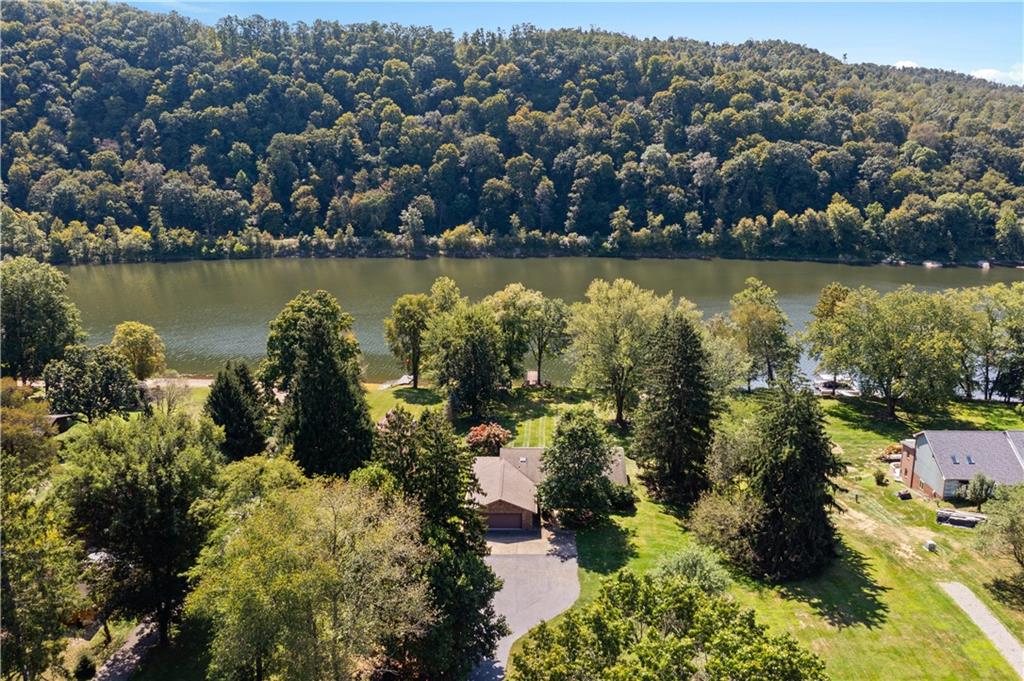 1164 River Road Freeport, PA 16229 - Photo 4 of 50 an aerial view of residential building with outdoor space and lake view