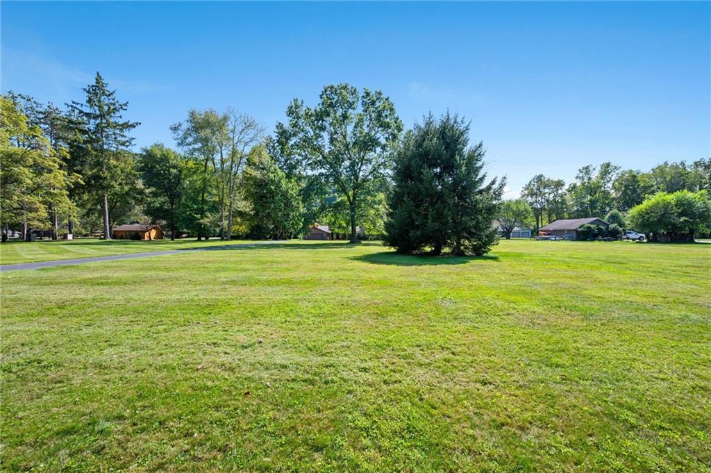 1164 River Road Freeport, PA 16229 - Photo 44 of 50 a view of a field with trees in the background