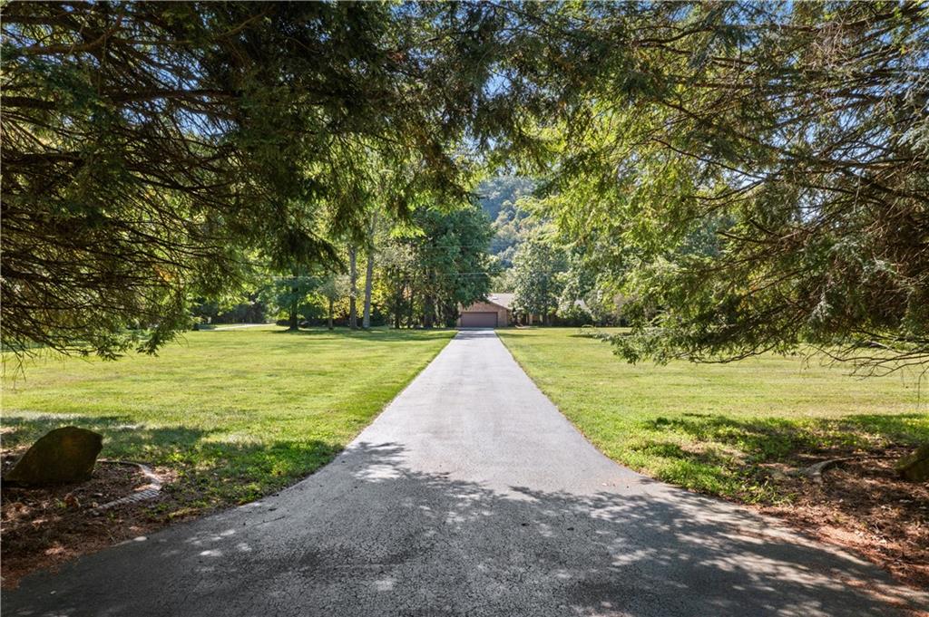 1164 River Road Freeport, PA 16229 - Photo 6 of 50 a view of a yard with an outdoor space