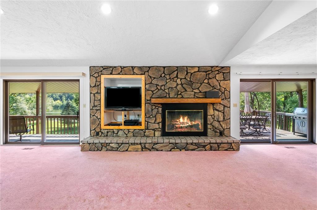 1164 River Road Freeport, PA 16229 - Photo 9 of 50 a living room with furniture and a fireplace