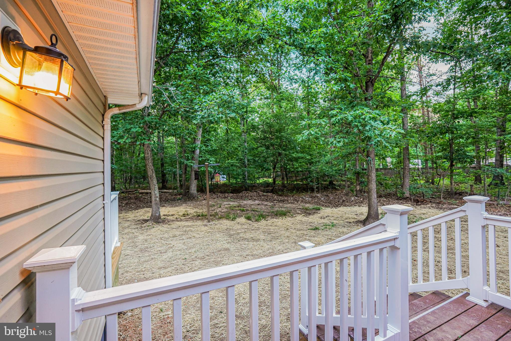 767 Loving Road Zion Crossroads, VA 22942 - Photo 30 of 33 a view of a wooden fence and trees