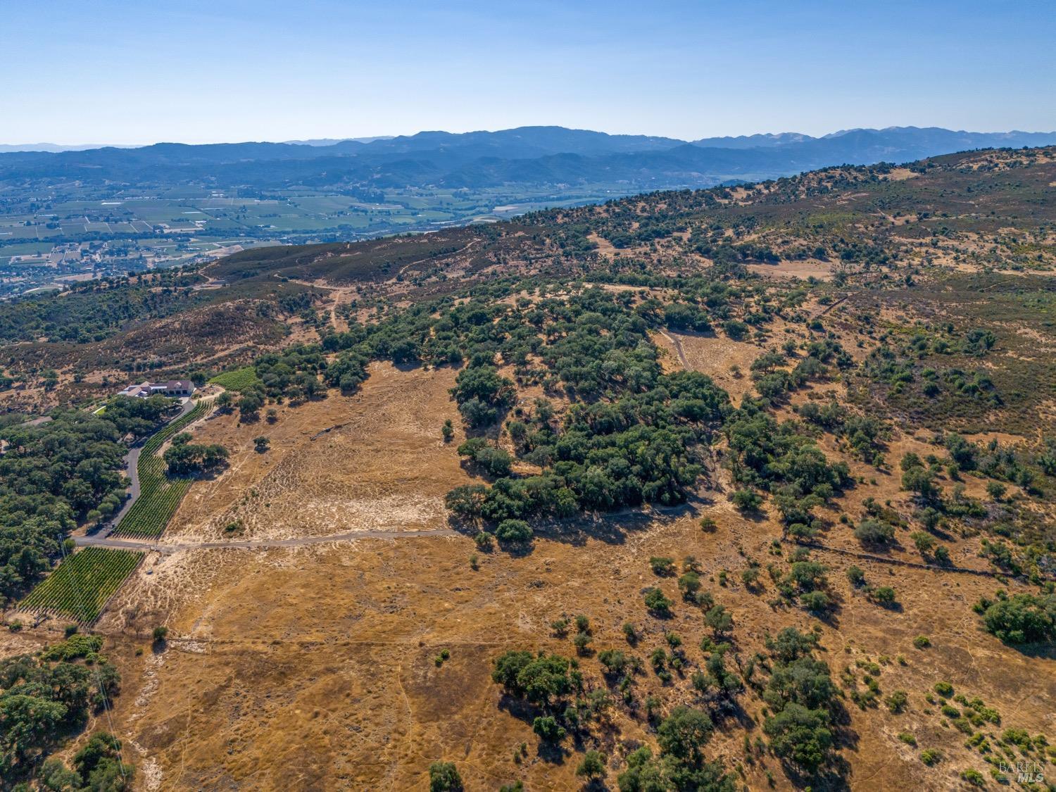 2863 Atlas Peak Road Napa, CA 94558 - Photo 7 of 27 an aerial view of residential house and green space