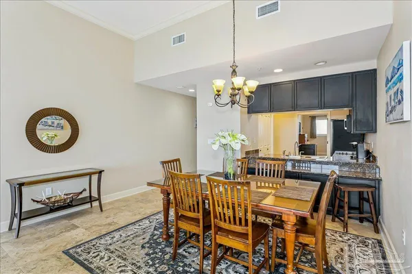 a kitchen with a sink a stove and refrigerator