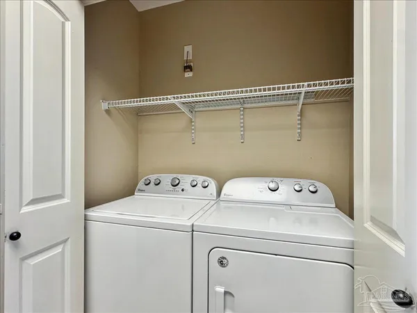 a kitchen with stainless steel appliances granite countertop a sink stove and microwave
