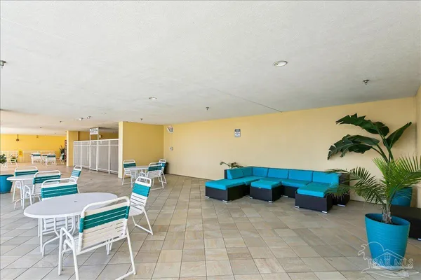 a view of outdoor space with wooden floor and staircase