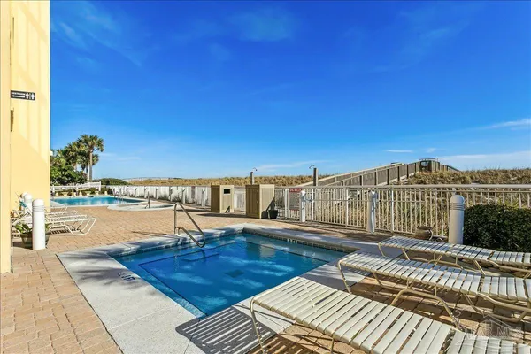 a view of an ocean beach and mountain