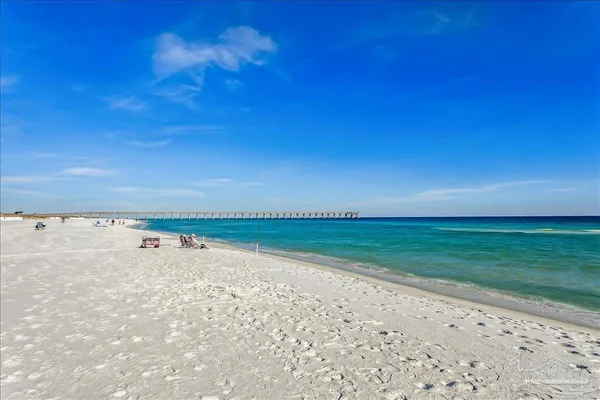 a view of a balcony with an ocean view